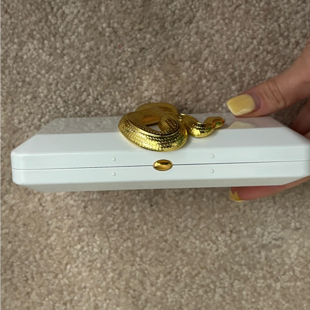 Kilian Paris The Dawn Art Deco White Metal Clutch
Golden Snake Swarovski Eye - Picture 4 of 6